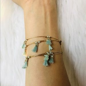 Light aqua & gold 3 layered tassel bracelet. NWOT
